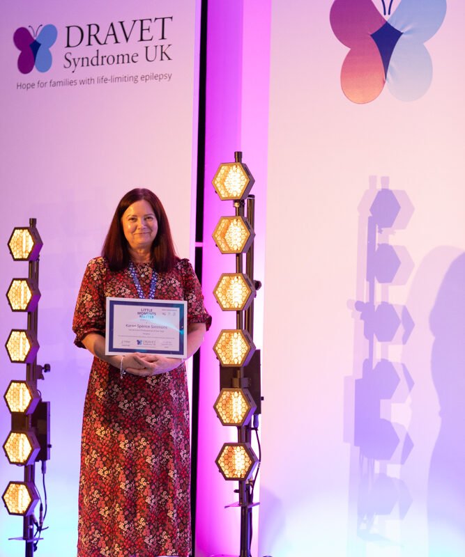 Karen Spence-Simmons receiving her finalist certificate