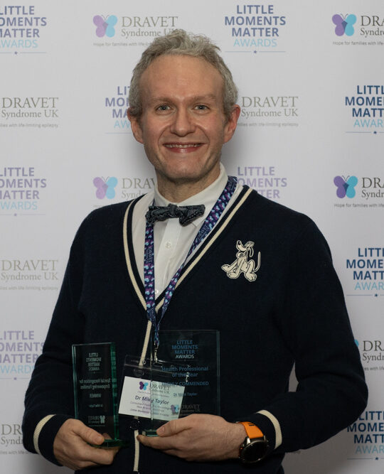 Dr Mike Taylor receiving his awards